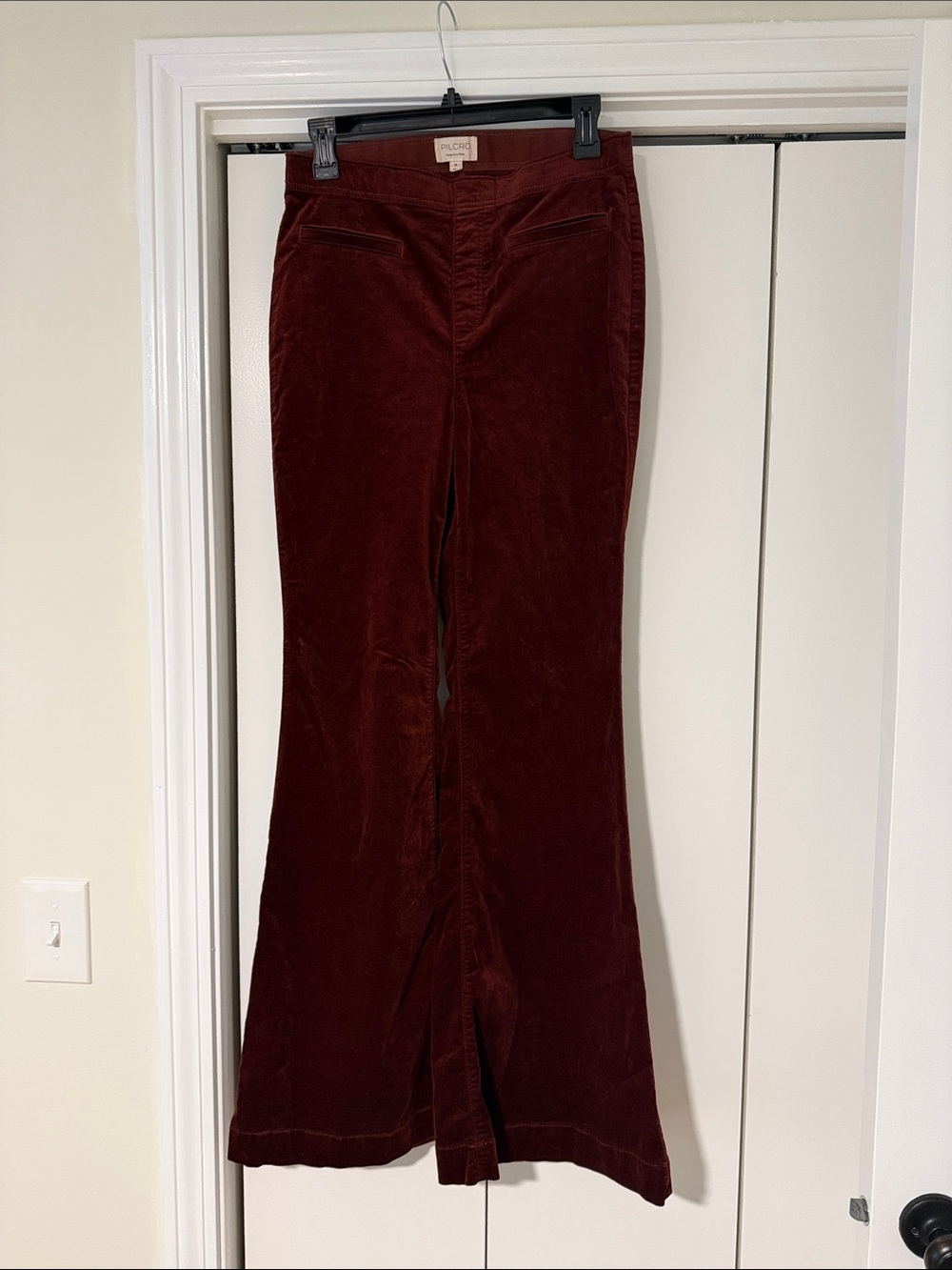 Pilcro Corduroy Flare Pants in Deep Wine
